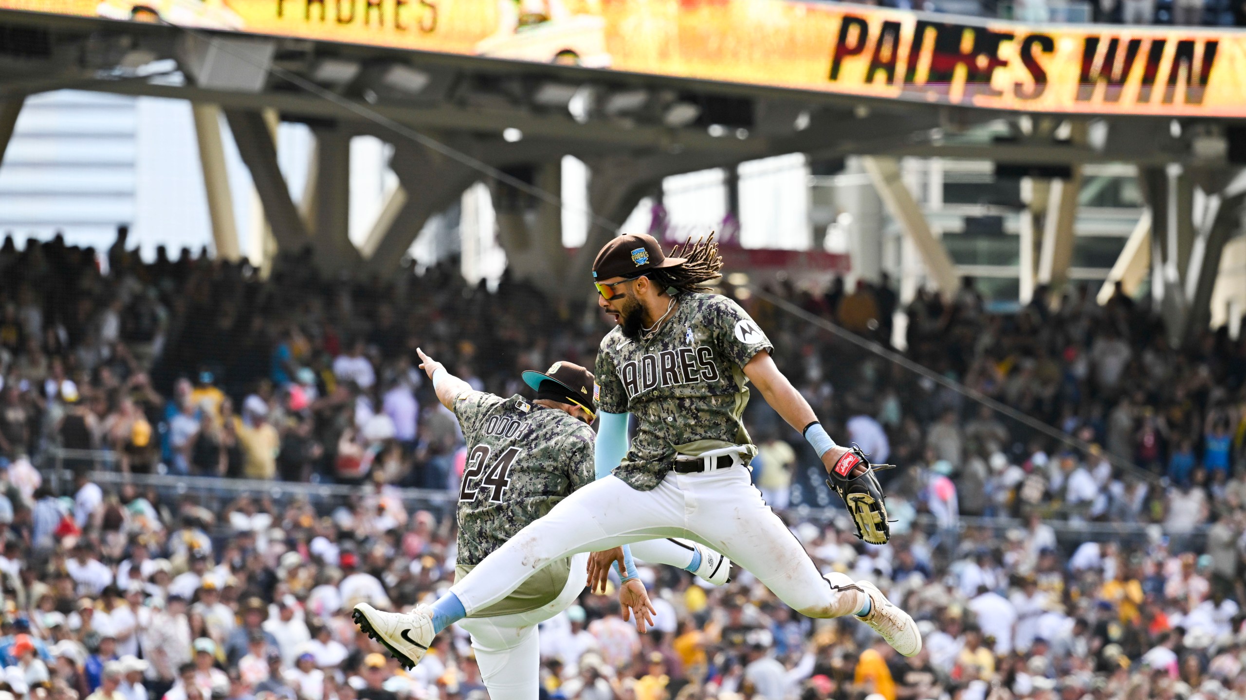 A packed San Diego Padres crowd lit up at Petco Park